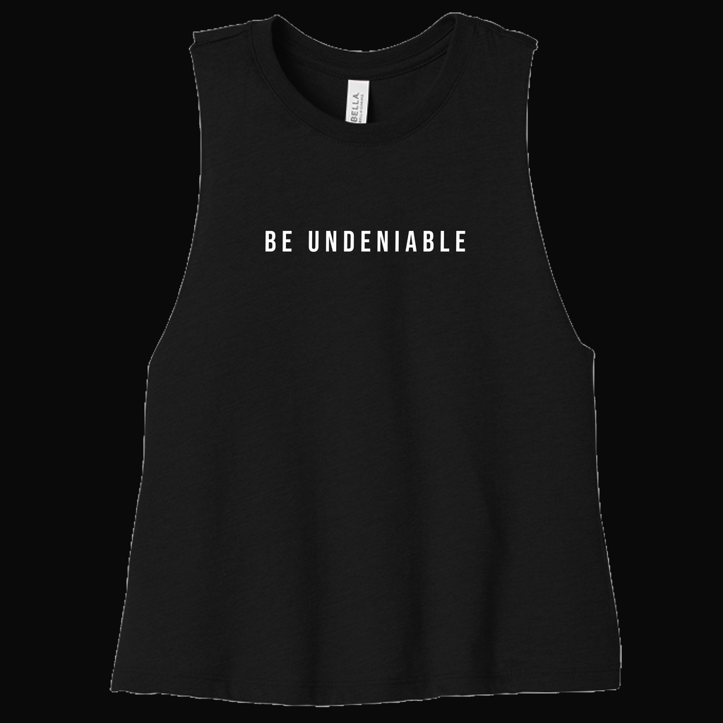 BU Women’s Cropped Racerback Tank on dark background
