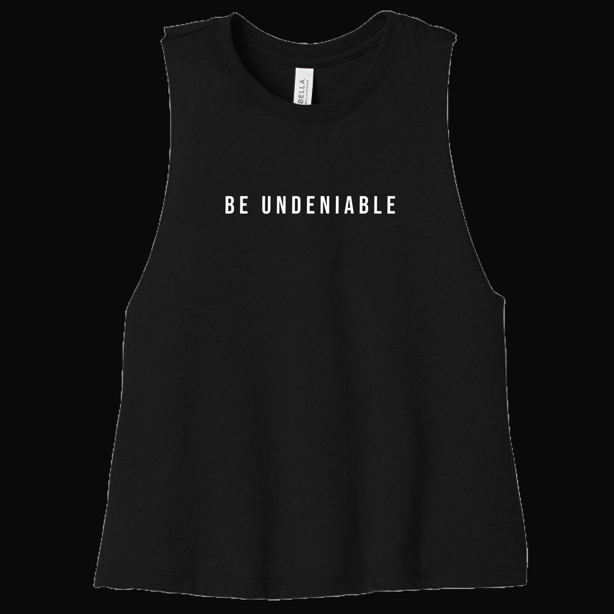 BU Women’s Cropped Racerback Tank on dark background